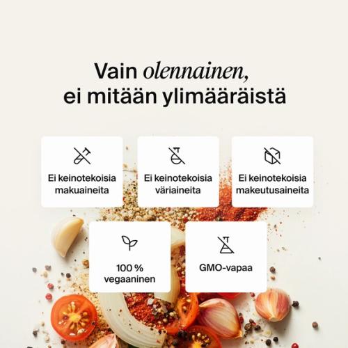 Kuivattujen vihannesten ja yrttien sekoitus neutraalinvärisellä taustalla