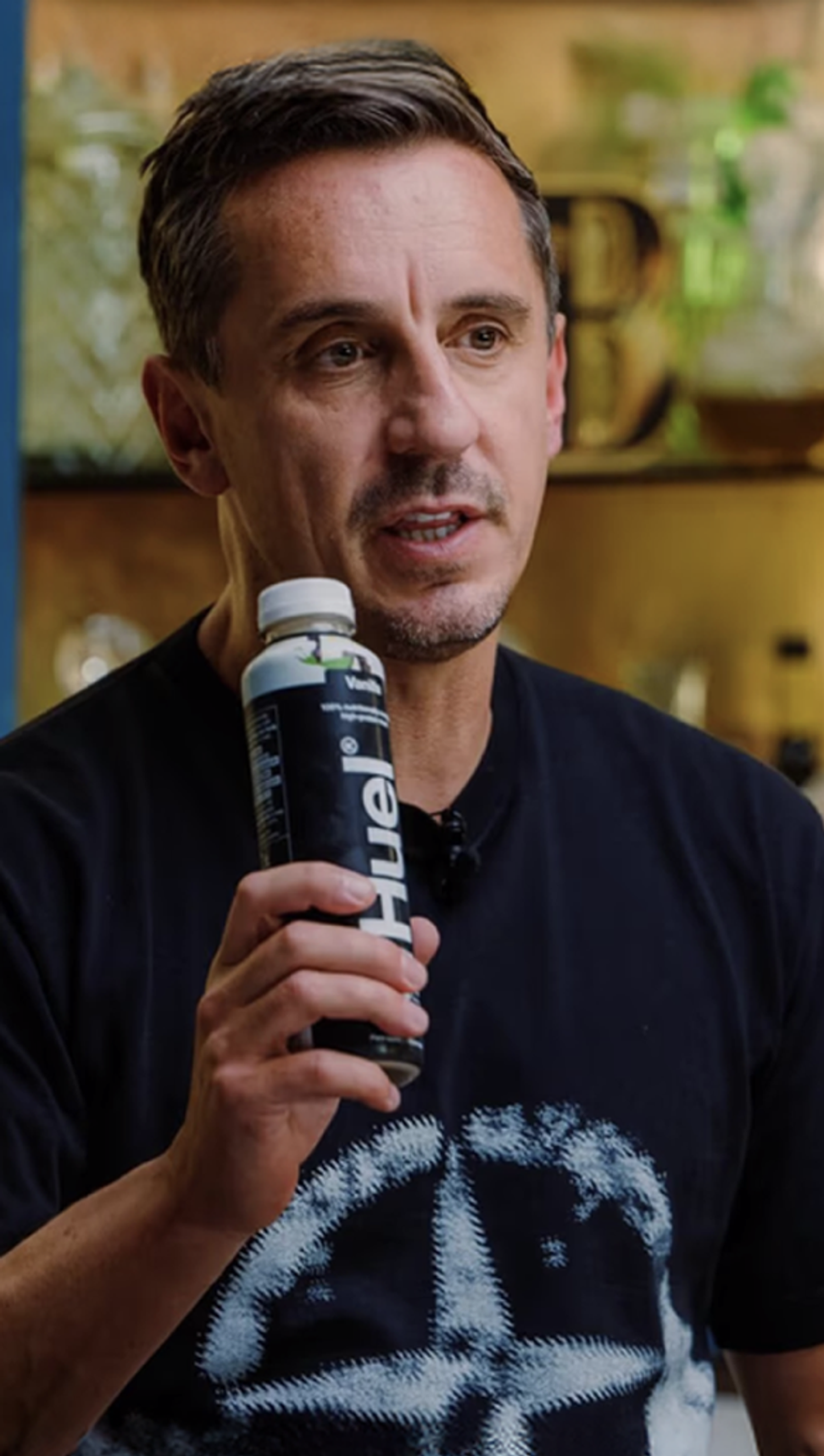 Gary Neville with a Huel Shaker