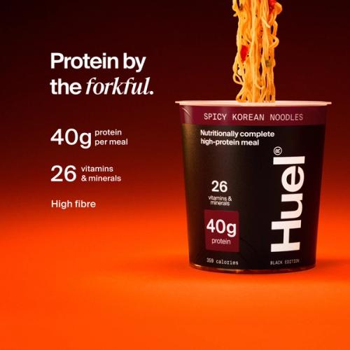 Huel Black Edition Noodles pot with noodles being lifted, alongside text highlighting 40g protein, 26 vitamins and minerals, and high fibre.