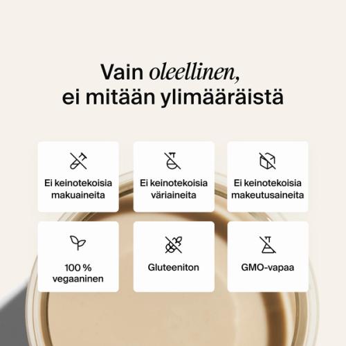 Ylhäältä kuvattu lasillinen Huel RTD:tä neutraalinvärisellä taustalla