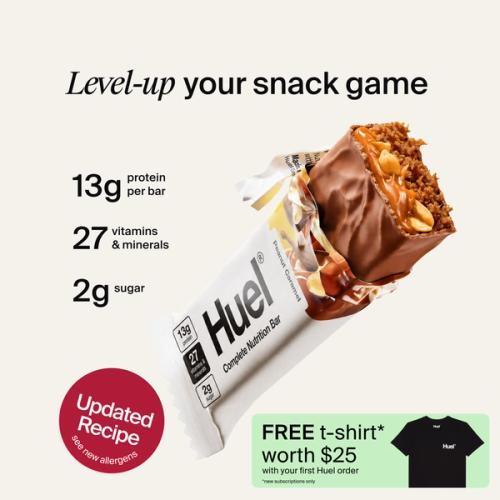A houeal.complete Nutrition bar with a peanut and caramel filling, set against a beige-colour background