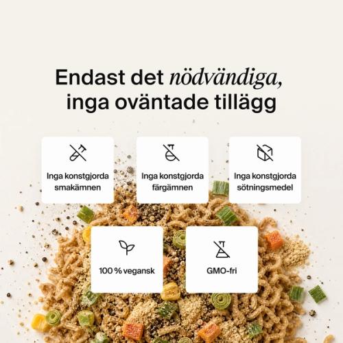 Dried vegetables, herbs and noodles mixed on a neutral colour background