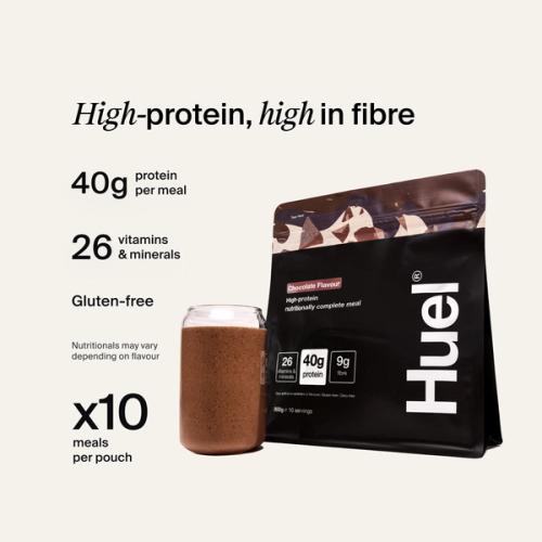 A bag of Huel Black Edition next to a glass containing a chocolate meal replacement drink, and nutritional information