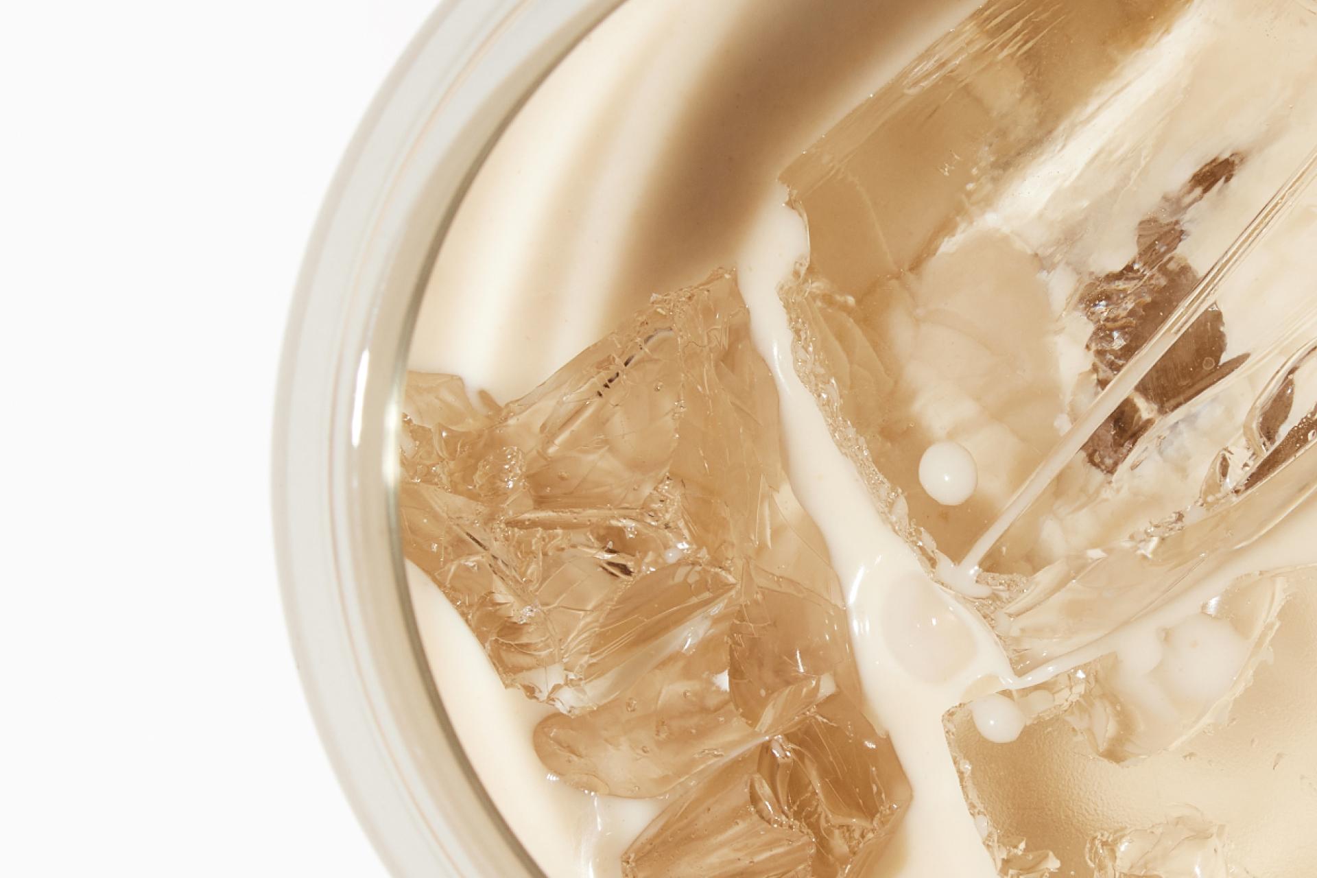 Image of Huel Ready-to-Drink protein drink in a glass with ice