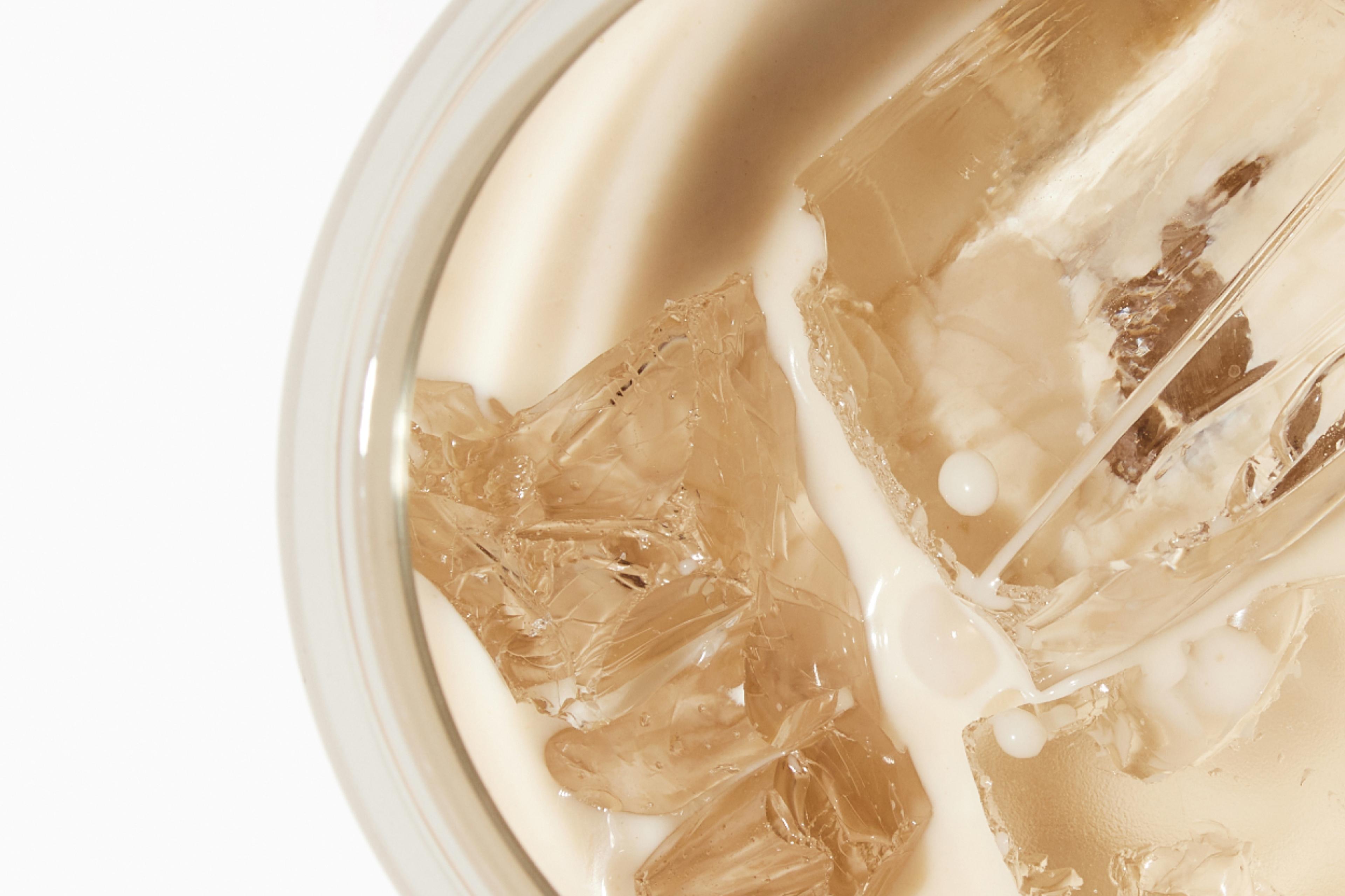 Image of Huel Ready-to-Drink protein drink in a glass with ice
