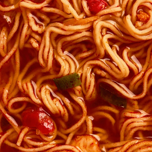 A close up of the noodles in their broth showing the flavour