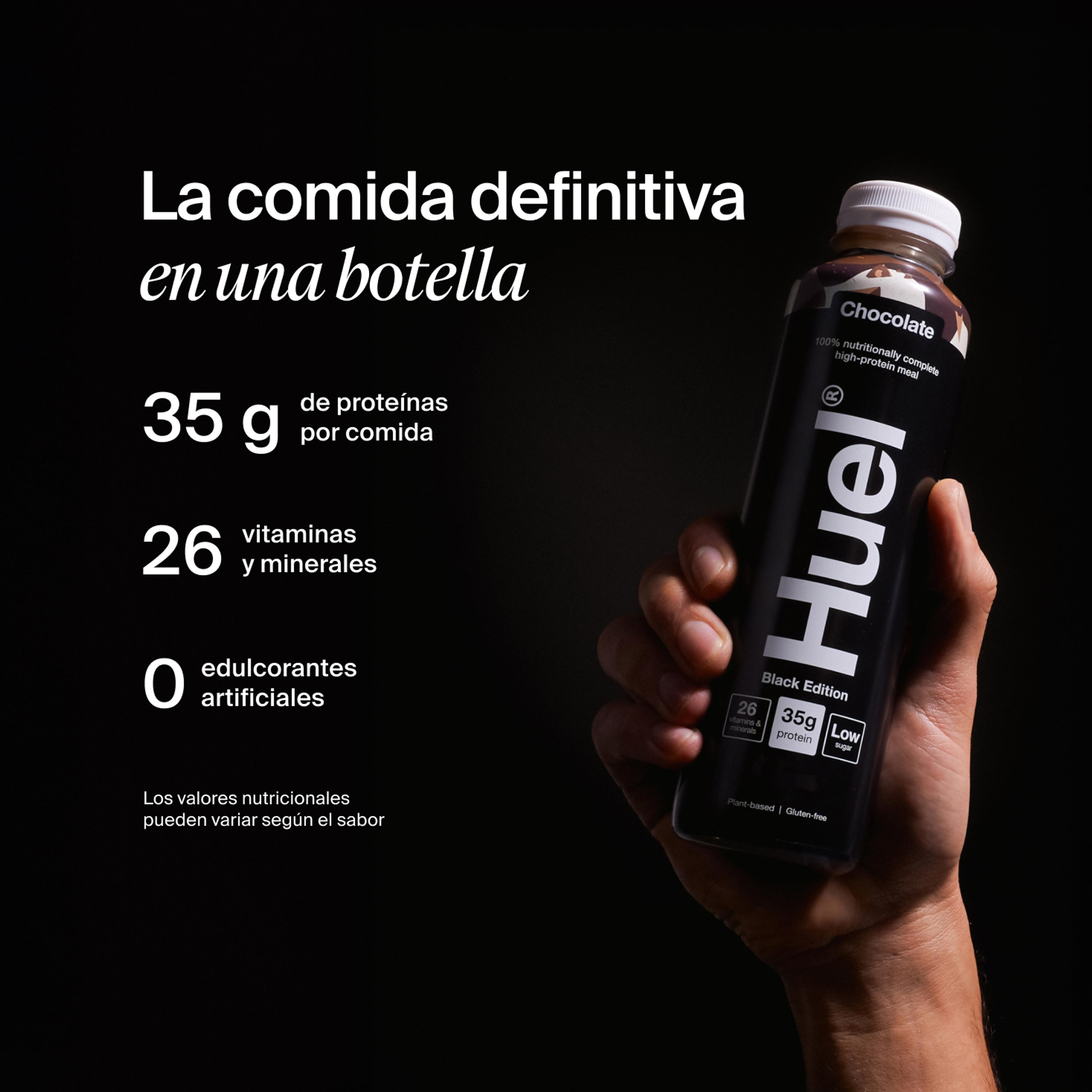 a hand holding a Bottle of Huel RTD with key benefits written next to it