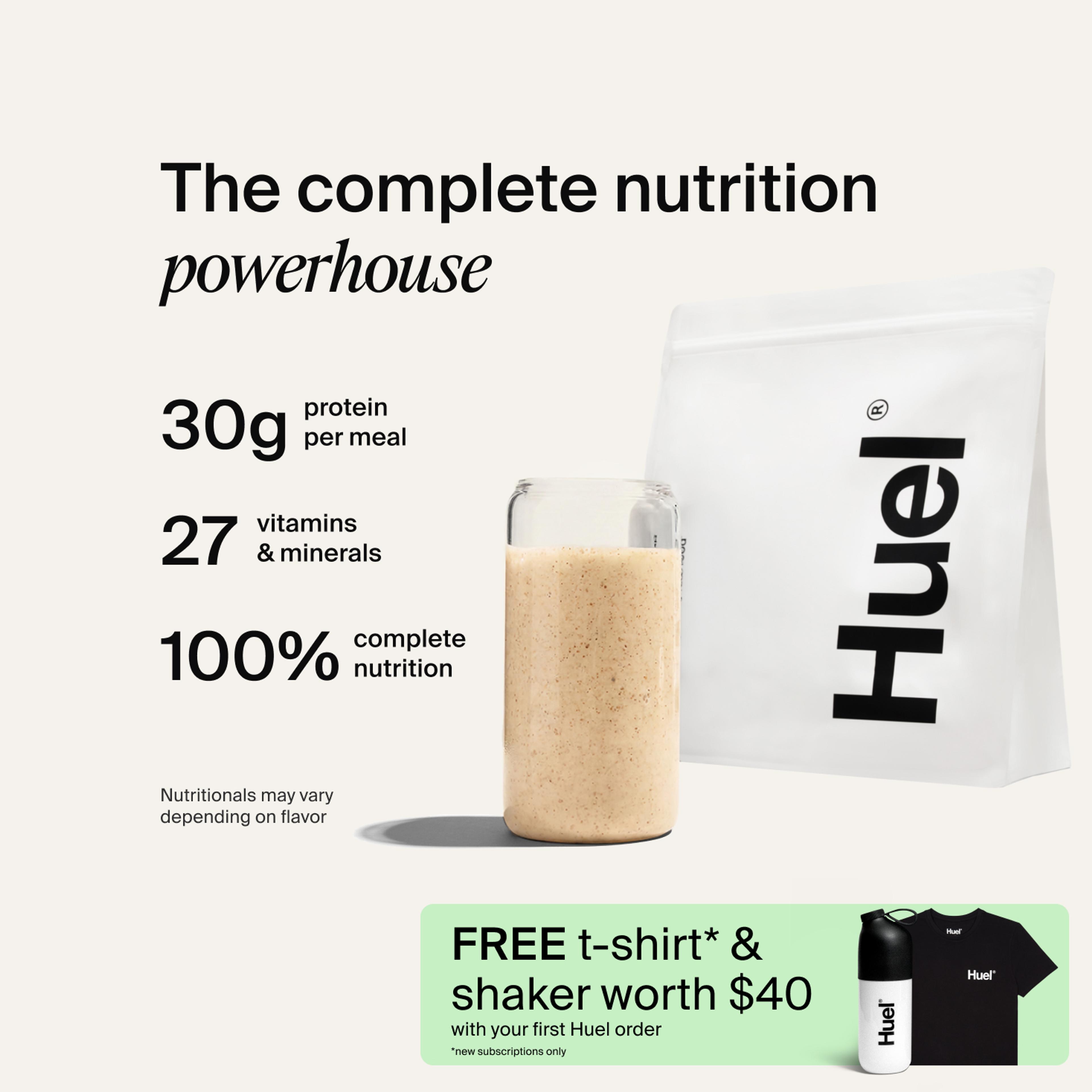 A bag of Huel powder next to a glass containing a Huel drink on a neutral background