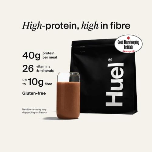 Huel Black Edition Powder bag with a prepared shake, alongside text highlighting 40g protein, 26 vitamins and minerals, up to 10g fibre, and that it is gluten-free.