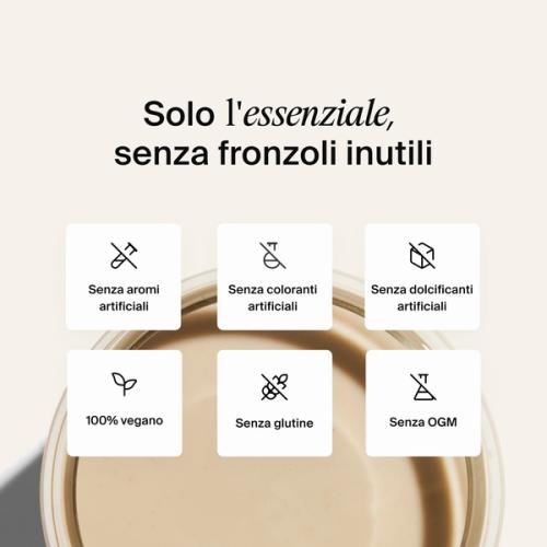 Above shot of a glass of Huel RTD on a neutral colour background