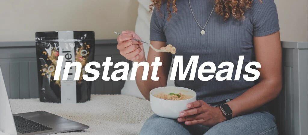 Woman eating Huel Hot & Savoury instant meal from a bowl