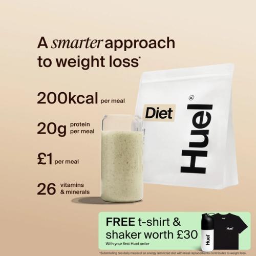 A bag of Huel Diet powder next to a glass containing a Huel drink on a beige background