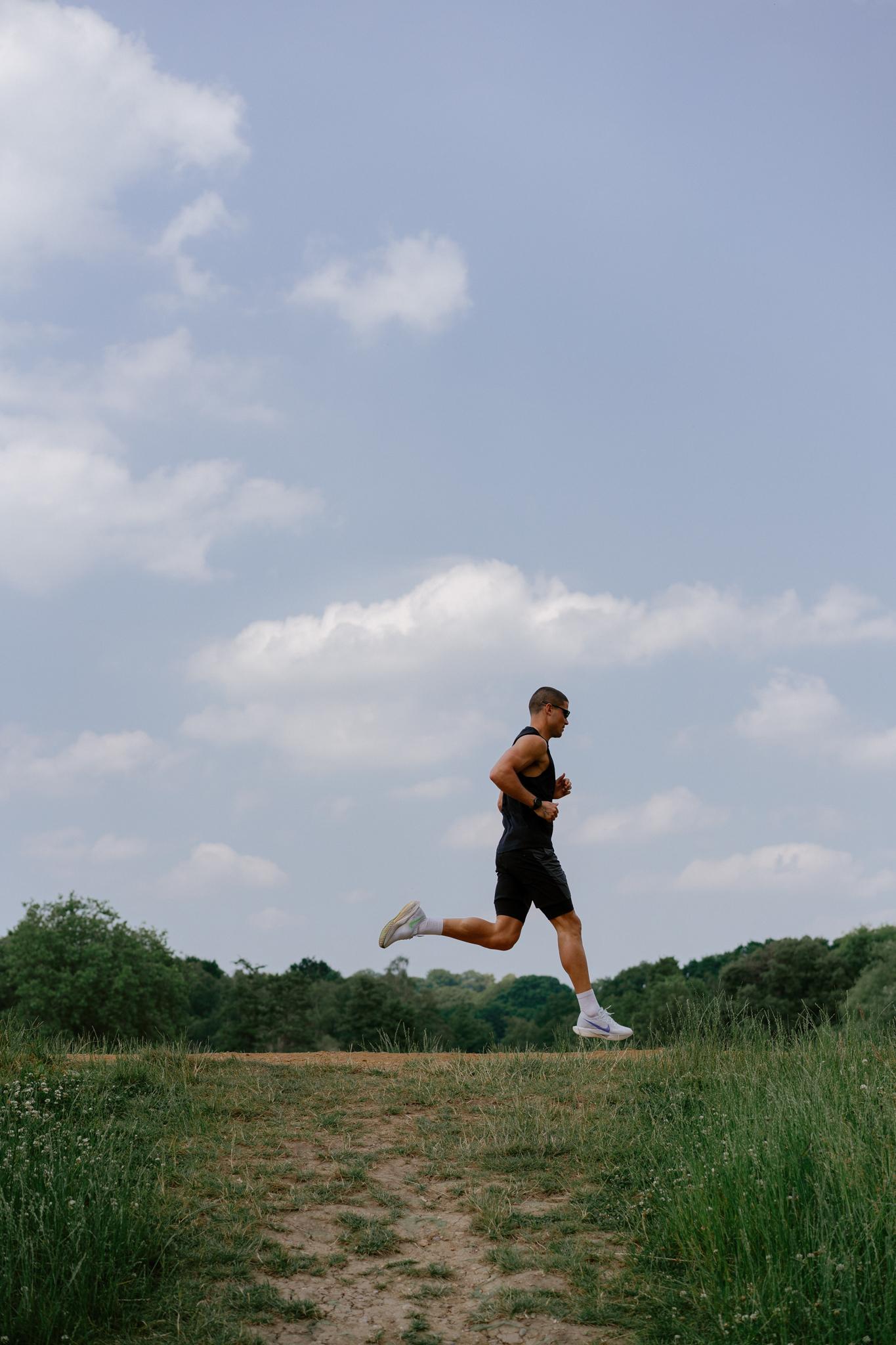 Will Goodge running outside on grass