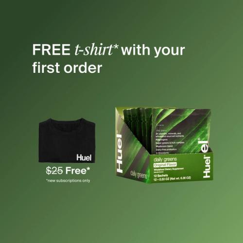 Daily Greens Travel Packs, a black Huel t-shirt, set against a beige background.