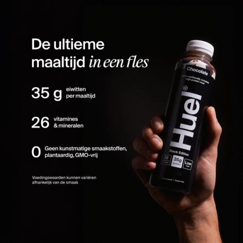 a hand holding a Bottle of Huel RTD with key benefits written next to it