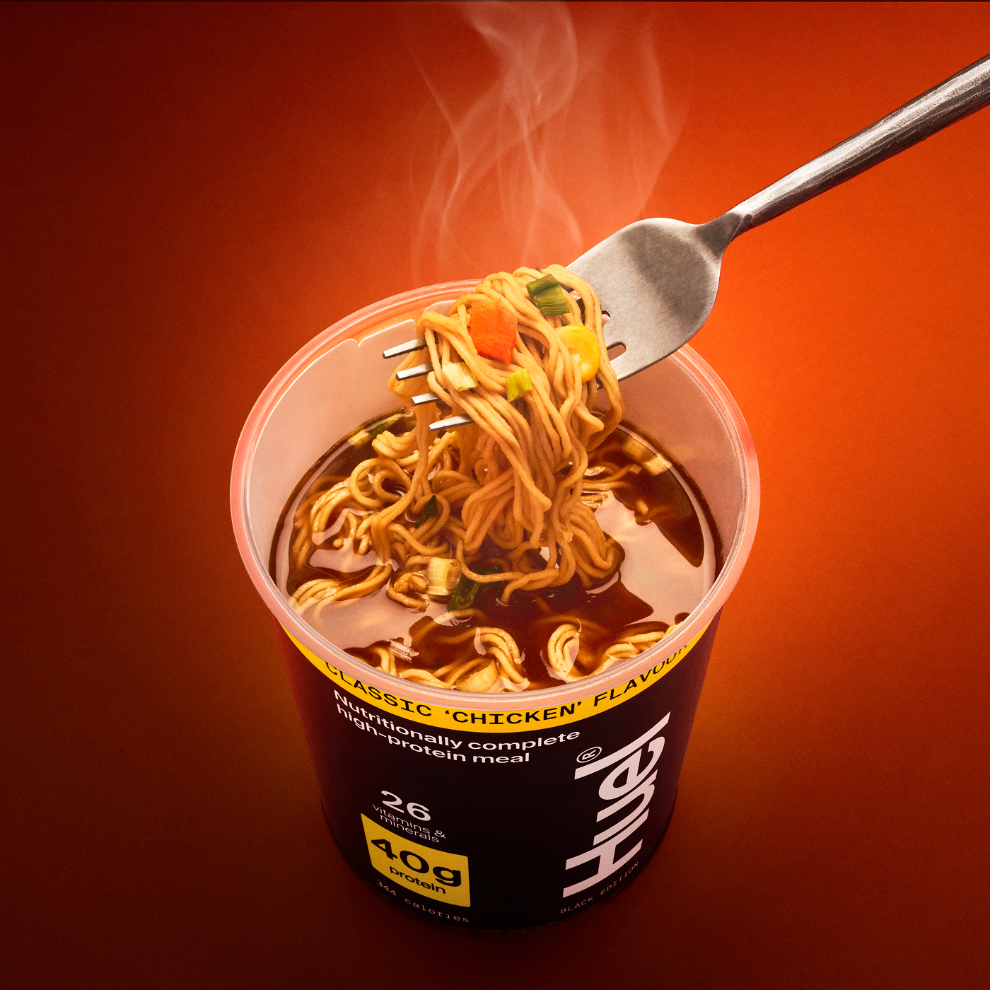 A fork pull of classic 'chicken' flavour on an orange gradient background