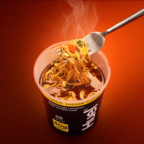 A fork pull of classic 'chicken' flavour on an orange gradient background