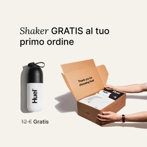 someone holding a Huel box containing a white powder bag, and a black and white shaker, on a neutral background