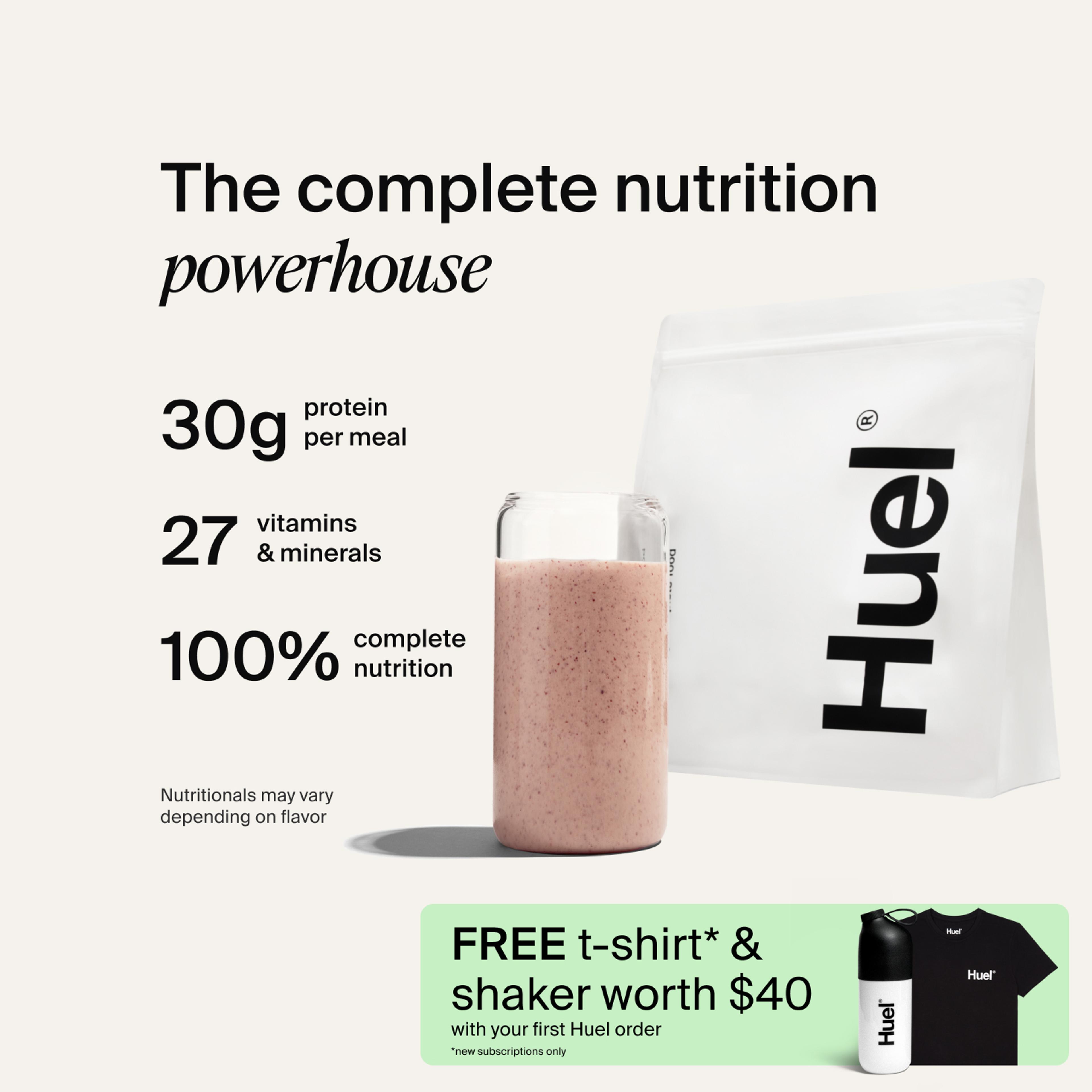A bag of Huel powder next to a glass containing a Huel drink on a neutral background