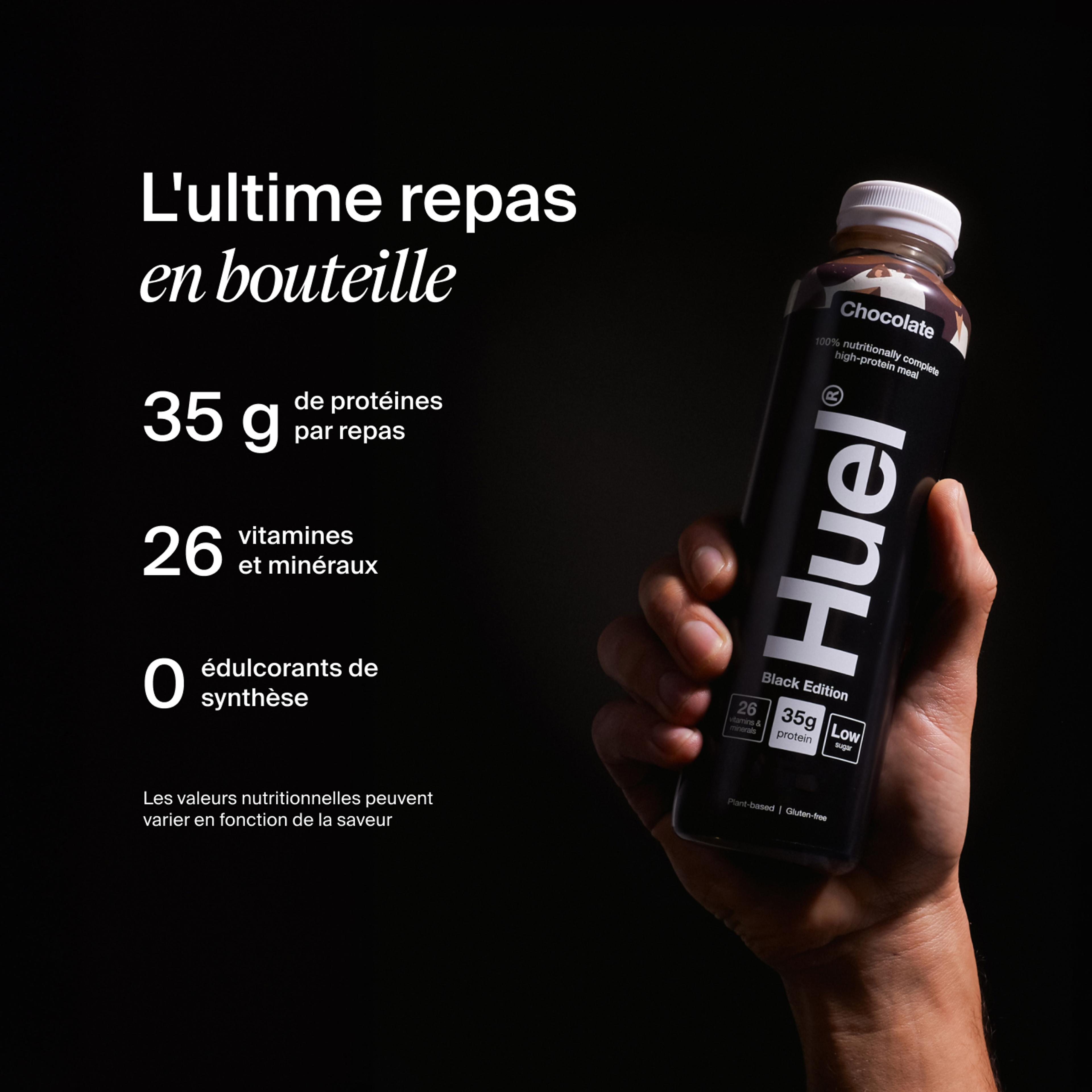 a hand holding a Bottle of Huel RTD with key benefits written next to it