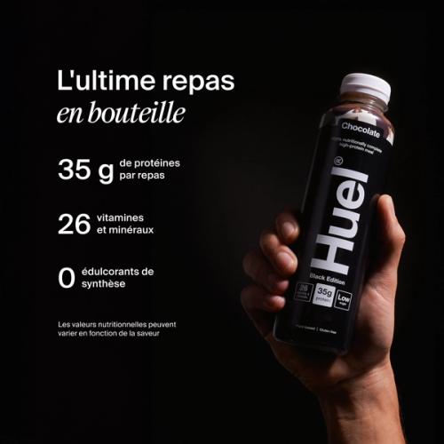 a hand holding a Bottle of Huel RTD with key benefits written next to it