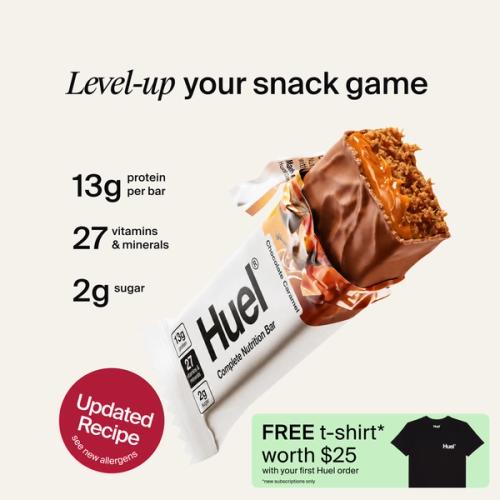 A houeal.complete Nutrition bar with a peanut and caramel filling, set against a beige-colour background