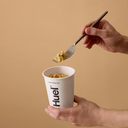 A person wearing a black t-shirt doing a Pot fork pull