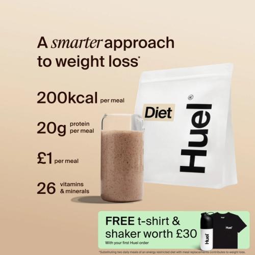 A bag of Huel Diet powder next to a glass containing a Huel drink on a beige background