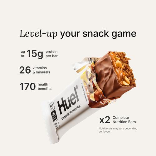 An image of a Huel Complete Nutrition protein bar in a ripped wrapper