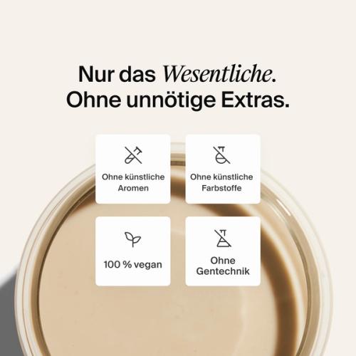 image of a glass of Huel meal replacement drink on a neutral colour background with key health benefits