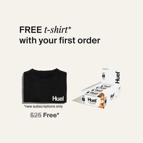A box of Huel complete nutrition bars on a neutral background next to a black Huel t-shirt