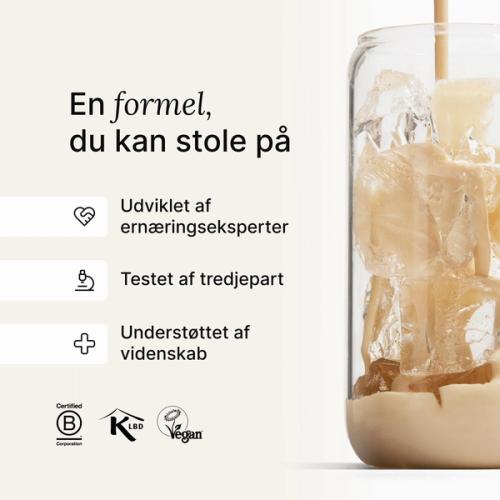 Huel meal replacement drink being poured into a glass of ice