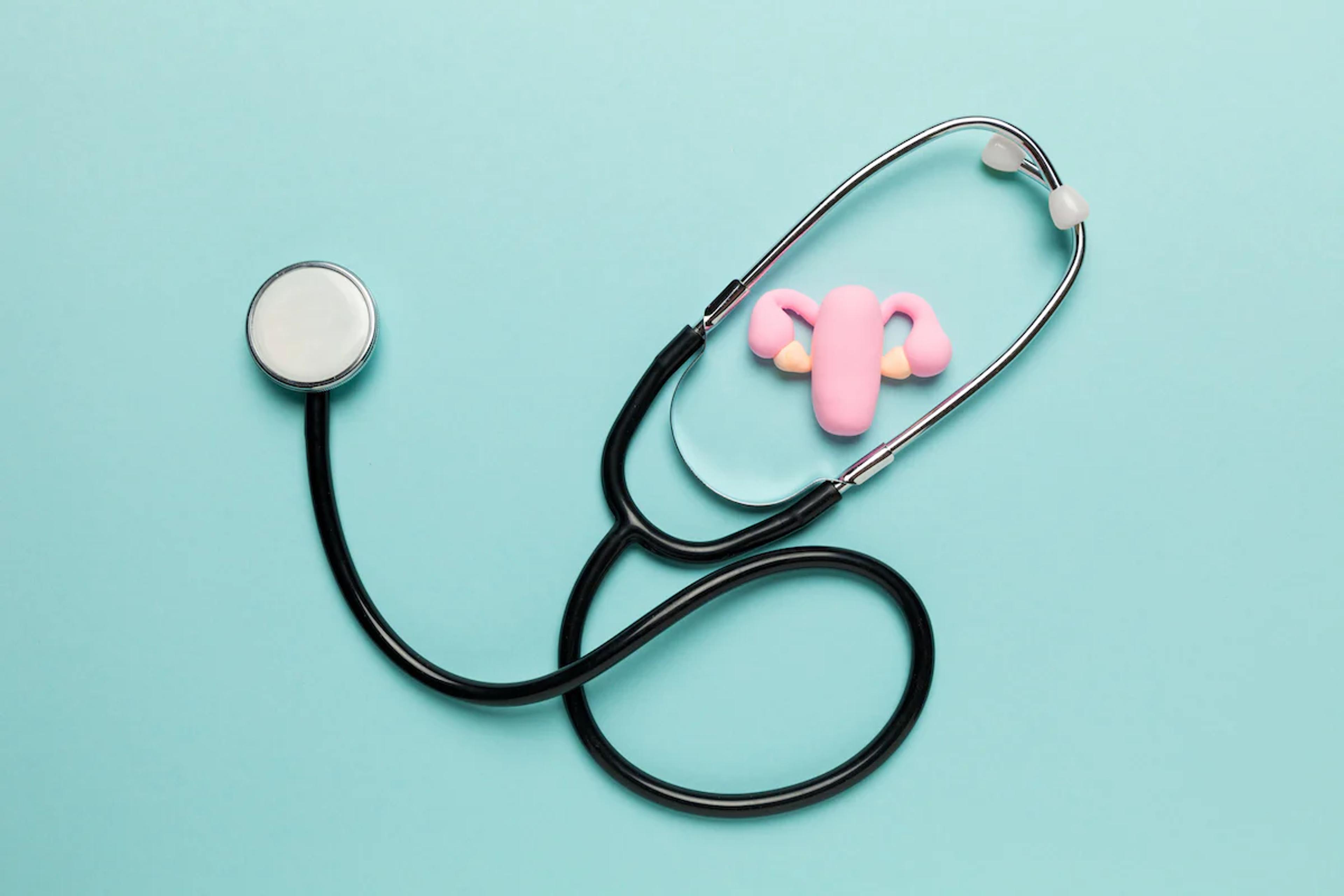 stethoscope on a teal background