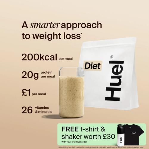 A bag of Huel Diet powder next to a glass containing a Huel drink on a beige background