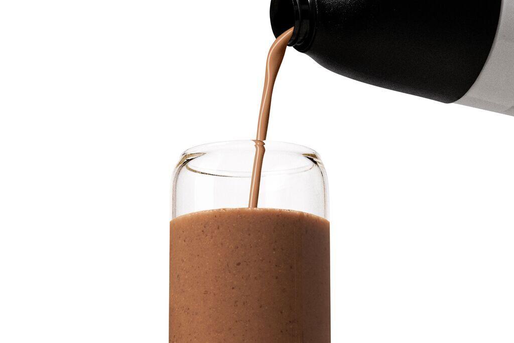 A Huel shaker on a cardboard box in the Huel warehouse