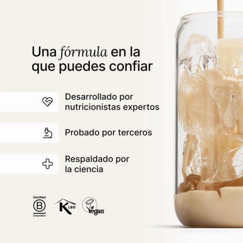 Huel meal replacement drink being poured into a glass of ice