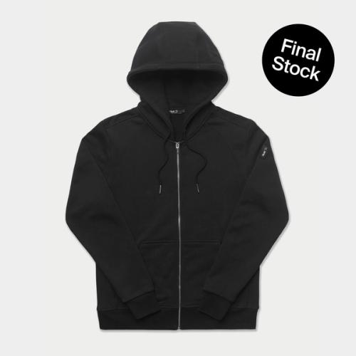 A black zip up hoodie laying flat on a beige background