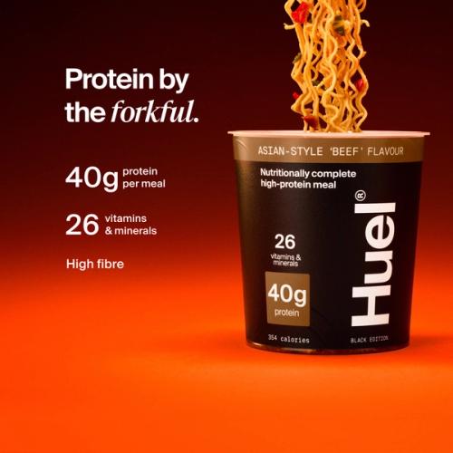Huel Black Edition Noodles pot with noodles being lifted, alongside text highlighting 40g protein, 26 vitamins and minerals, and high fibre.