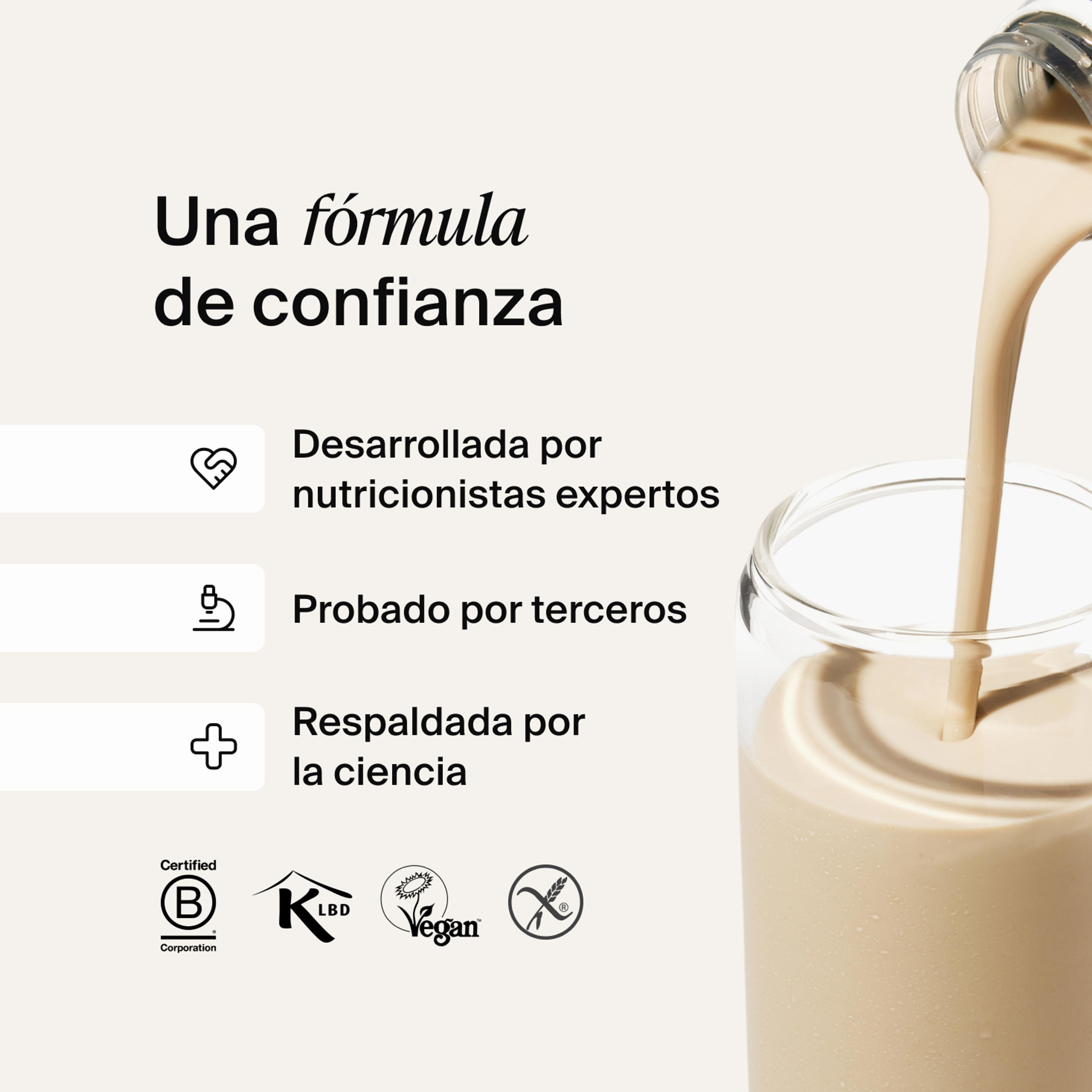 Huel RTD protein drink being poured into a glass
