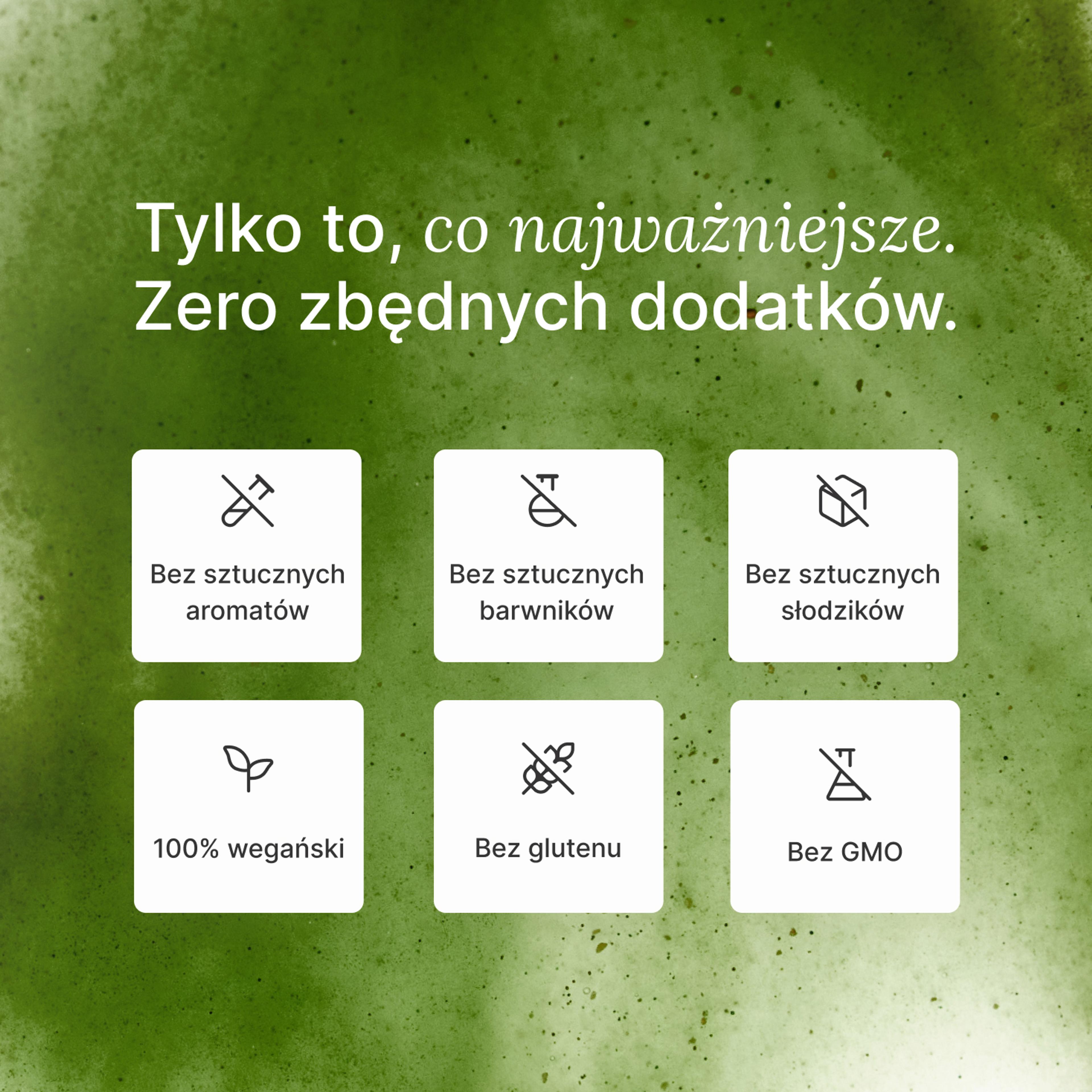 Zbliżenie na zieloną butelkę Huel Daily Greens z logo.