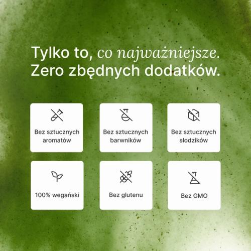 Zbliżenie na zieloną butelkę Huel Daily Greens z logo.