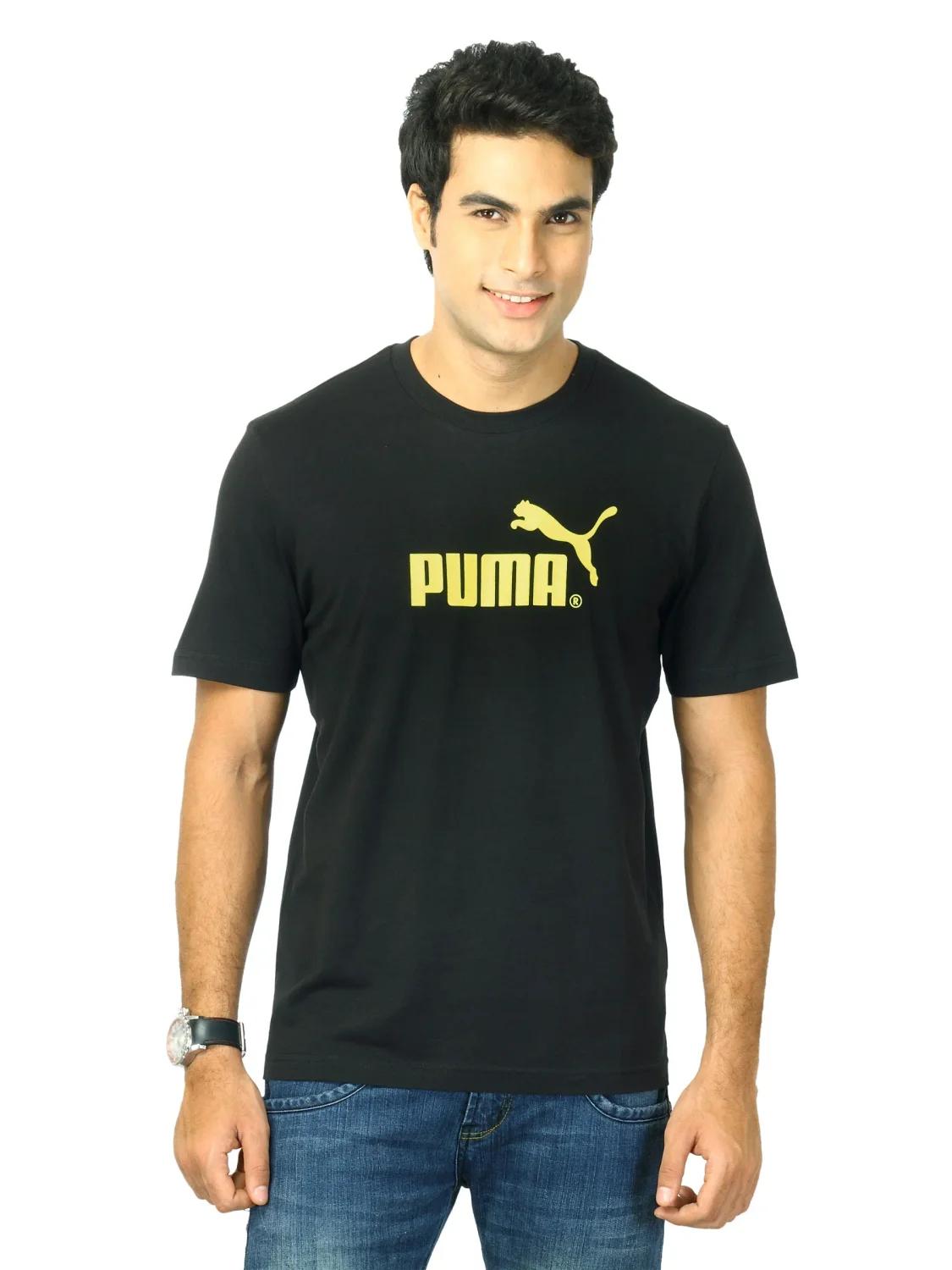 Black Puma T-shirt with yellow cat logo on a model, used as input for OpenAI image summary generation