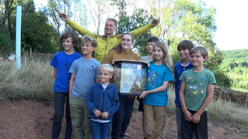 Chris Packham helps Eva and Emily release mice into the wild