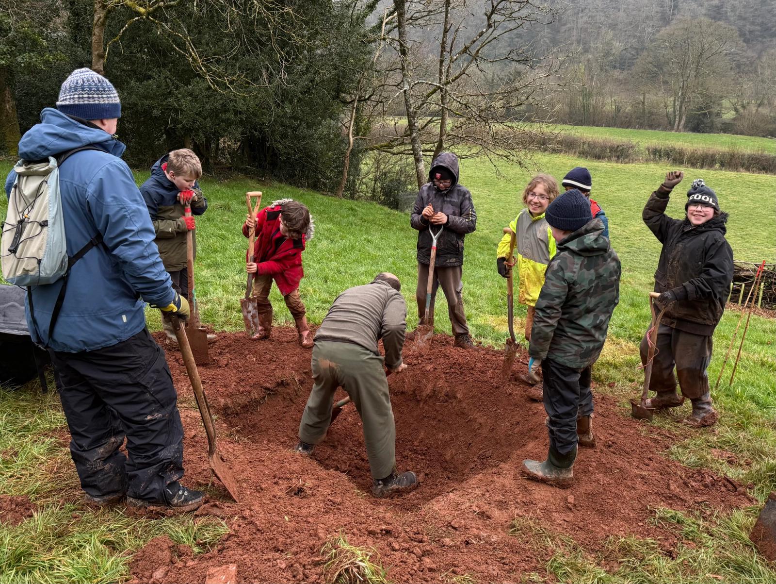 Local scout troop helping dig the harvest mice's new pond