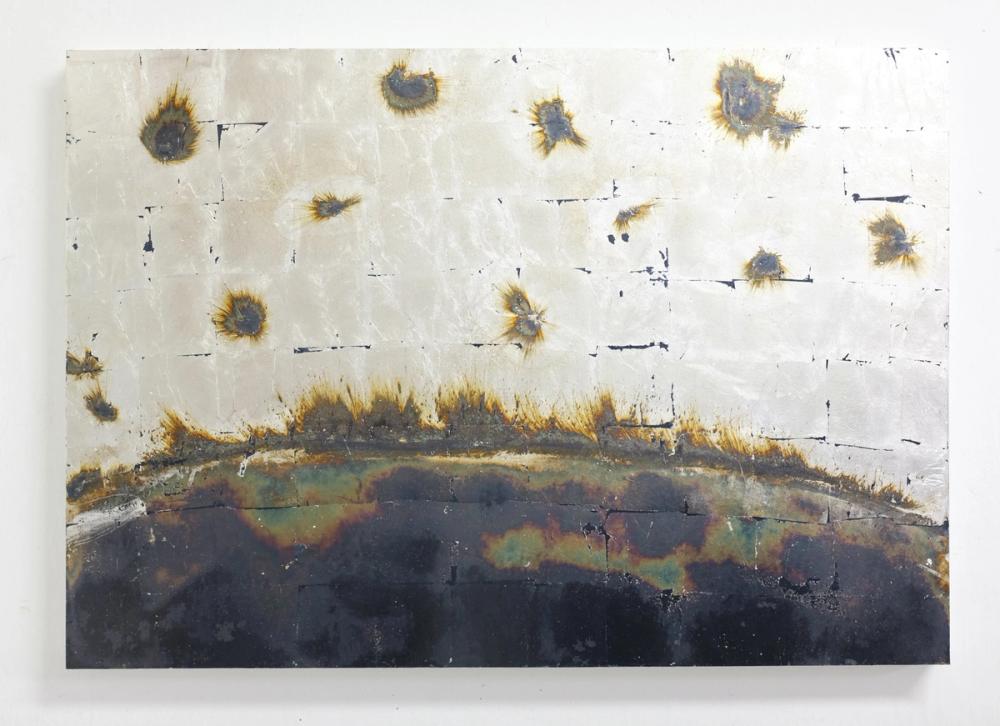 photograph of the artwork ultra dense matter, 2022, silver leaf on wood, 100x70 cm