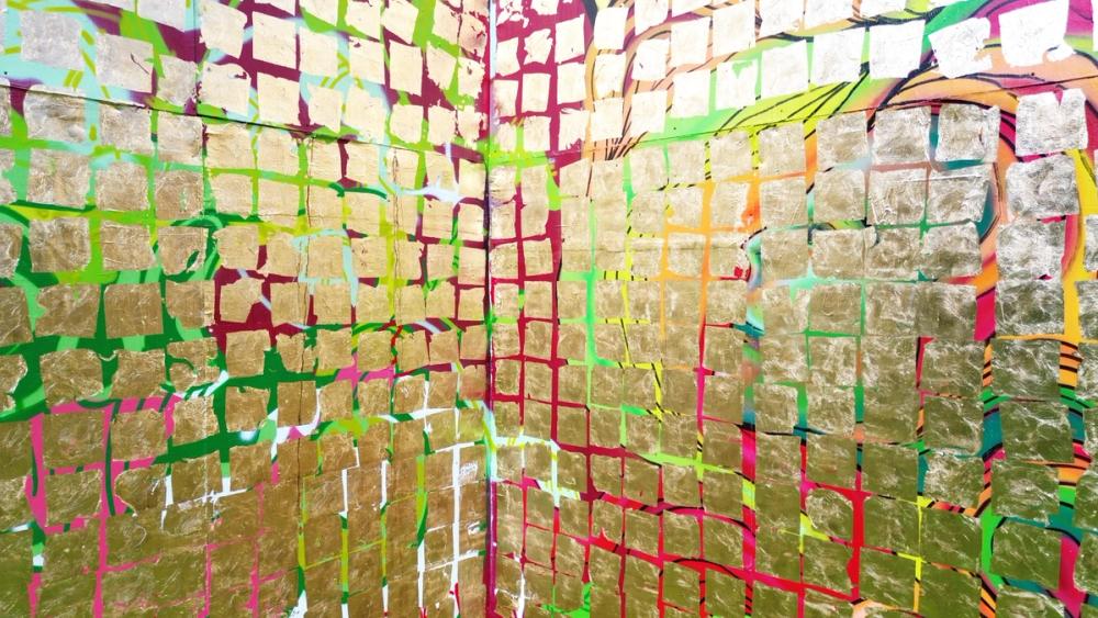 Photograph of the artwork Muralarum, 2025, brass on graffiti