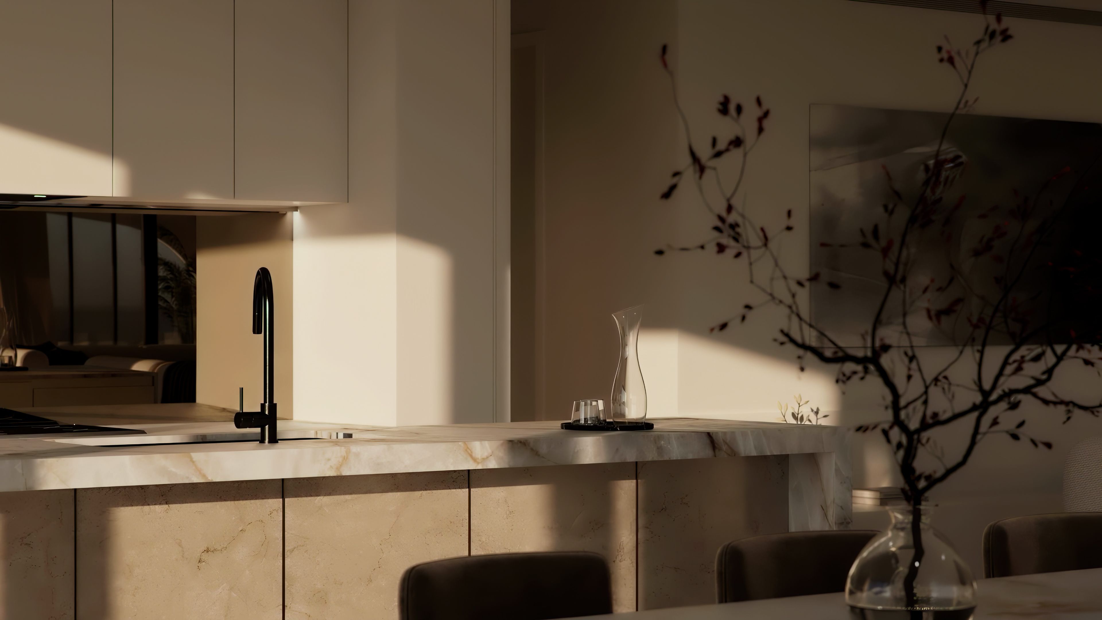a kitchen with a black and white painting on the wall