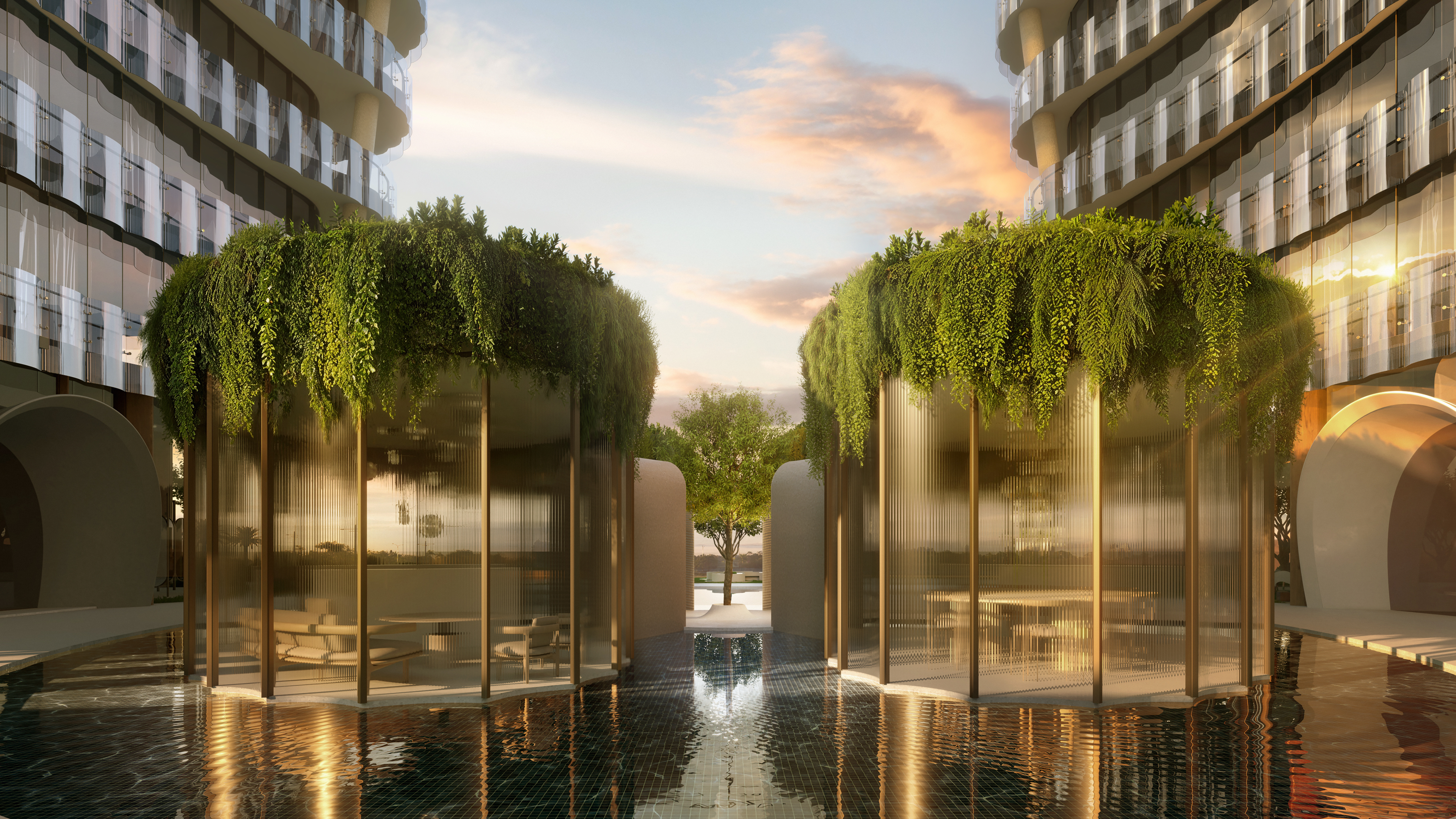 looking up at a tall building with a cloudy sky in the background .