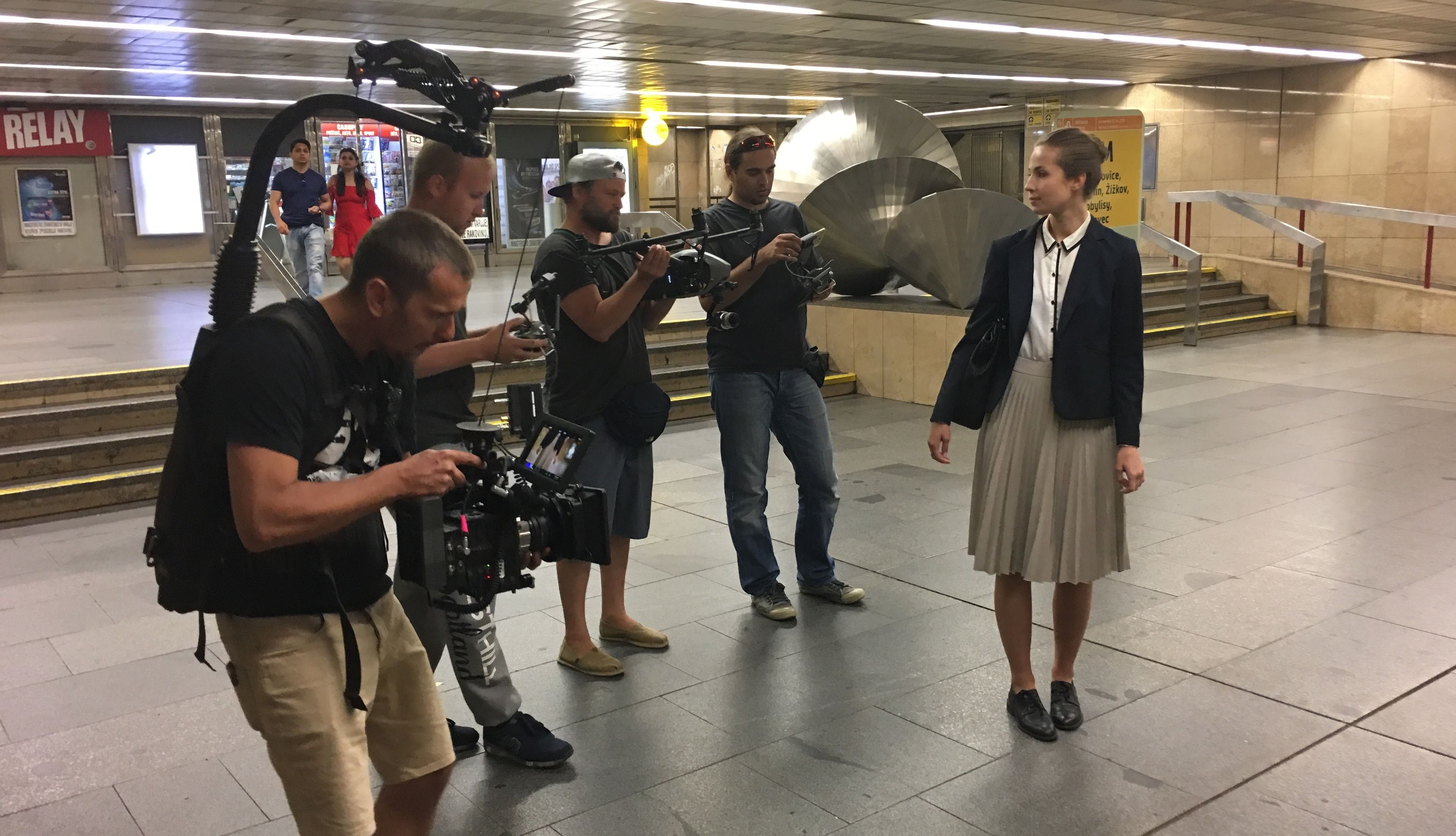 a black and white drawing of a slide in a building .