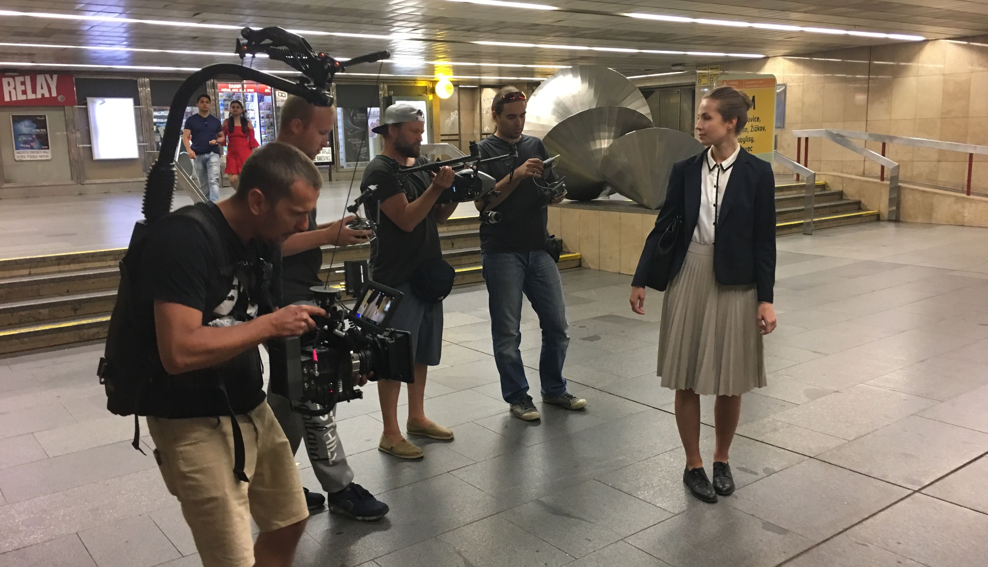 a black and white drawing of a slide in a building .